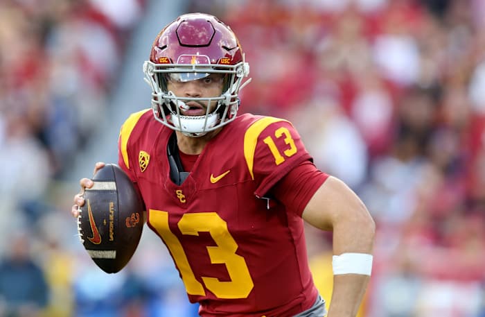 Nov 18, 2023; Los Angeles, California, USA; USC Trojans quarterback Caleb Williams (13) scrambles during the second quarter against the UCLA Bruins at United Airlines Field at Los Angeles Memorial Coliseum.